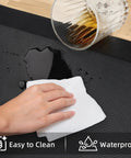 Extra Thick Anti Fatigue Kitchen Mat Nine Tenths Inch Thick Cushioned Standing Desk Mat With Memory Foam Comfort Non Slip Waterproof Rug For Kitchen Floor Office And Sink Twenty By Thirty Two Inches being wiped clean after liquid spill
