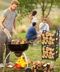 Man using barbecue grill with Two Tier Firewood Rack With 3 Hanging Hooks Heavy Duty Steel Wood Holder nearby in a garden setting