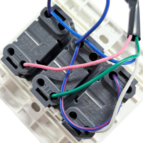 Close-up of Anbaochi 10A Wall Switch For Chandelier Hoist Lifter wiring connections with multiple color-coded wires.
