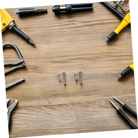 Hella Solid Mini Screw Kit For Eyeglass And Laptop Repair Packs Durable Self Tapping Screws on wooden surface with tools.