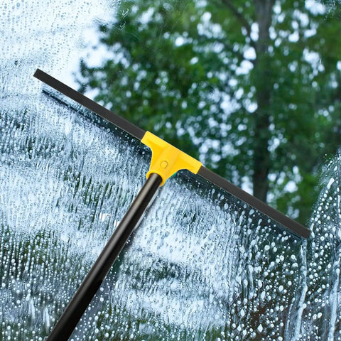 Built Tough 24 Inch Floor Squeegee With 60 Inch Extendable Handle wiping water from glass window