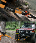 4x4 Off-Road Recovery Kit With 33,000lbs Tow Strap 20ft in use with a 4x4 vehicle, showing tree saver attachment