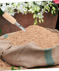 Stainless Steel Grain Sampler Tool With Wooden Handle over a sack of grains for wheat, rice, corn, sorghum sampling in labs, farms.