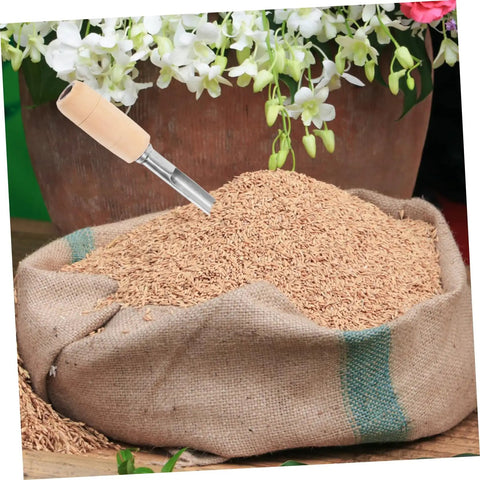 Stainless Steel Grain Sampler Tool With Wooden Handle over a sack of grains for wheat, rice, corn, sorghum sampling in labs, farms.