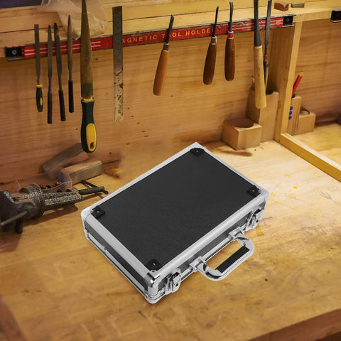 Hella Sturdy Aluminum Alloy Tool Storage Case With Reinforced Carry Handle And Lockable Portable Gear Box Organizer For Auto Mechanics And Hardcore Diy Crews on a workbench.