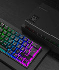Compact 60 Percent Mechanical Gaming Keyboard Featuring Silky Linear Red Switches And Detachable Type C Cable Built For Sick Desk Setups And Lightweight Travel Rigs PC PS5 PS4 Black with RGB backlighting.