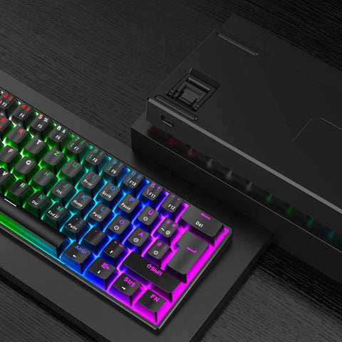 Compact 60 Percent Mechanical Gaming Keyboard Featuring Silky Linear Red Switches And Detachable Type C Cable Built For Sick Desk Setups And Lightweight Travel Rigs PC PS5 PS4 Black with RGB backlighting.