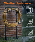 Freestanding Heavy Duty Garden Hose Holder Stand With Rustproof Steel Build Stable Base And Handy Tool Hooks in use outside a brick wall