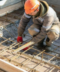 Worker using 10 Roll 16 Gauge Rebar Tie Wire Kit with Galvanized Anti Rust Baling Wire on construction site