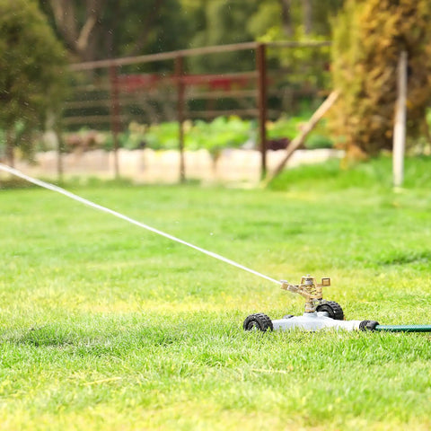 Heavy Duty Full Metal Pulsating Sprinkler With Wheeled Base, 360 Degree Rotating Impact Sprinkler on grassy lawn