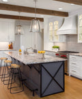 Bright kitchen featuring dimmable LED recessed ceiling lights, white cabinets, granite island, and pendant lighting.