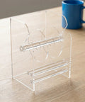 Acrylic Label Dispenser With Adjustable Three Slots For Shipping And Fast Paced One Hand Loading For Printing Shops DIY Areas And Busy Ecommerce Workflows A Reliable Label Roll Holder And Tape Storage Solution, clear acrylic front view