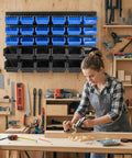 Rock Solid Heavy Duty Wall Mount Tool Organizer Rack With Thirty Spacious Compartments for garage storage with blue and black bins.