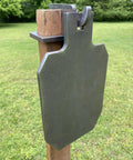 12 Inch Tall IDPA IPSC Steel Shooting Target With 3/8 Inch AR500, Unpainted Hanger Target And 2x4 Topper Hook mounted on a post outdoors.