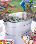 Aspen Heavy-Duty Oval Stainless Steel Drink Cooler For Parties 25-Quart Large Ice Bucket includes beverages and ice on table