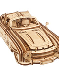 Winged Sports Coupe 1:24 Wooden Model Kit for Adults, DIY 3D Puzzle Car With Gull Wing Design, Pull Back Ratchet Key Action, Realistic Details, Gearhead Approved Auto Hobby Favorite, front view