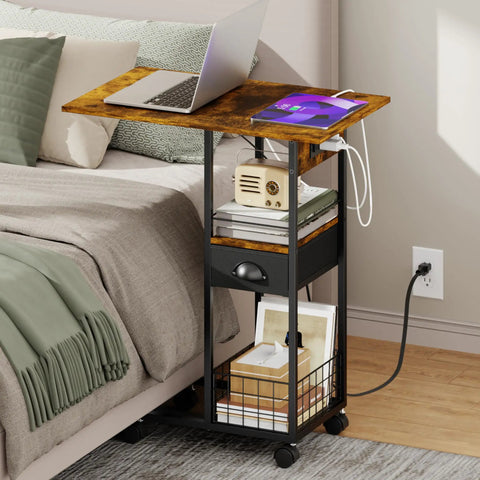 C Shaped Side Table With Charging Station And Wheels For Bedroom Living Room And Home Office Type C USB Ports And Two AC Outlets To Charge Up To Four Devices Plug And Play beside bed