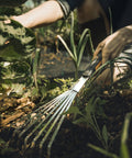 Person using Xact Hand Rake For Raised Garden Beds And Small Planters Workhorse Tool With Ergonomic Handle, Stainless Steel Head And Tines.