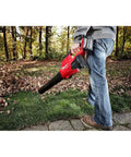 Person using M18 FUEL Cordless Handheld Blower With 120 MPH Air, 450 CFM Power, Brushless 18-Volt Lithium-Ion, Battery Sold Separately in yard