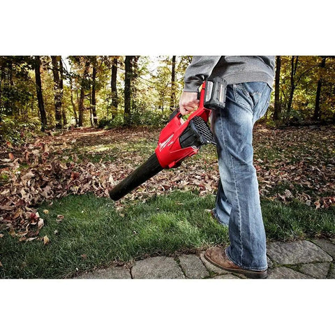 Person using M18 FUEL Cordless Handheld Blower With 120 MPH Air, 450 CFM Power, Brushless 18-Volt Lithium-Ion, Battery Sold Separately in yard