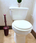 Heavy Duty All Purpose Plunger With Smart Air Release Valve And Eight Cup Capacity For Knocking Out Nasty Clogs In Toilets Kitchen Sinks Bathtubs And Garbage Disposals Top Shelf Plumbing Tool next to a white toilet.