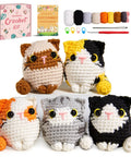 Five amigurumi cats with Easy Peasy Beginner Crochet Kit, including yarn, stuffing, eyes, hook, needle, and markers displayed.