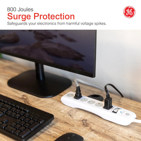 No Fuss Rock Solid Surge Protector Power Strip With Ten Foot Extension Cord on desk, six grounded outlets, 800 joules protection.