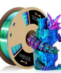 Tri Color 1.75mm PLA Filament Silk Rainbow Dope Multicolor spool with blue dragon print; coextruded red green blue, glossy finish