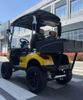 Yellow Electric Golf Cart Two Seater With Cargo Bed Rock Solid Frame Non Slip Tires Independent Suspension Full Led Lighting in urban setting.