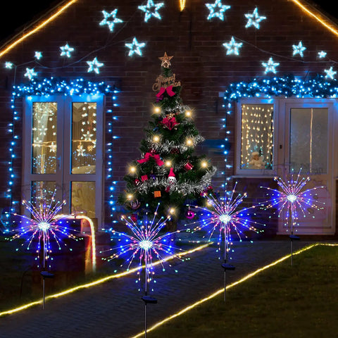 Colorful Solar Garden Firework Lights 4 Pack Outdoor Waterproof 120 LED Sparklers illuminating a decorated patio pathway.