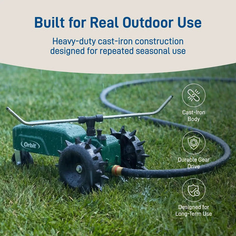 Self Propelled Traveling Sprinkler Delivers Hands Free Wide Lawn Coverage with a rugged cast iron body in garden setting