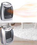 Ceramic Space Heater Heats Up Fast For Up To 200 Sq Ft With 1500W And 750W Settings shown in sleek silver design, emits warm air.
