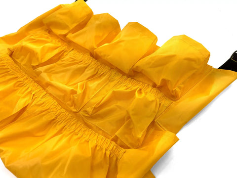 Janitorial Trash Can Caddy Bag Fits 32 To 48 Gallon Cans With 12 Pockets, close-up view of yellow fabric and pockets.