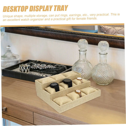 9 Slot Watch Tray Linen Storage Organizer With Cushioned Dividers Jewelry Display Plate showing watches on a dresser.