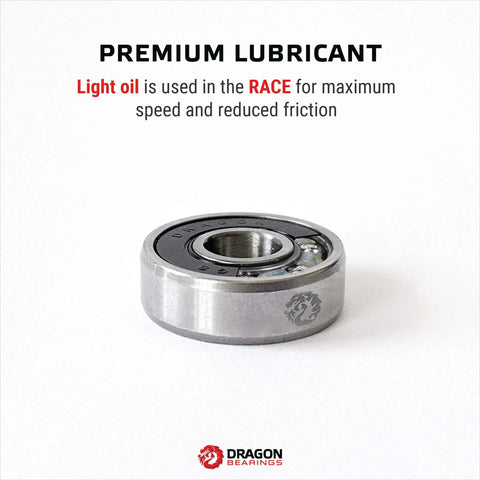 Dragon Bearings inline skate bearing, silver metal with black seal and Dragon logo.
