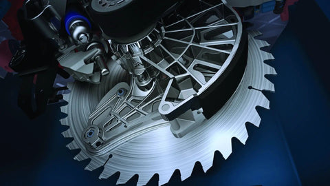 Close-up of a table saw blade with Dual Activation Cartridge Unit With Two Single Shot Cylinders For Two Activations.