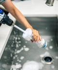 Drill Powered Bottle Brush Cleaner For Water Bottles Mugs Cups Pots Glasses Jars Blenders And Pitchers White And Blue in use