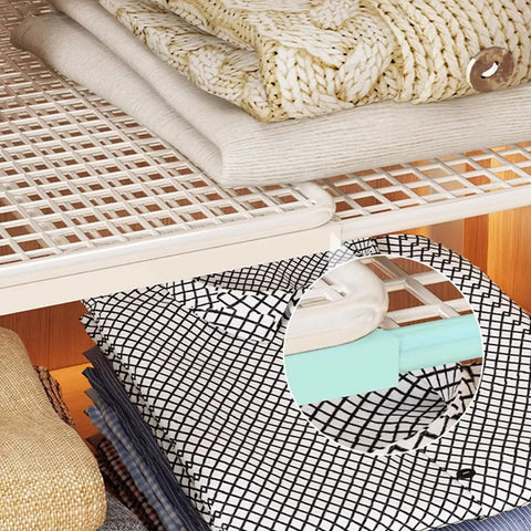 Closet Shelf Organizer Metal Storage Rack for Home Wardrobes with folded linens on industrial iron frame.