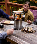 Mesa XL Heat Deflector with 3 detachable legs for fire pit captures and redirects warmth in 304 stainless steel, outdoor use