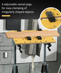 Tough As Nails Adjustable Work Bench Tool Table with four adjustable swivel pegs for clamping irregularly shaped objects.