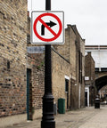 Large No Right Turn Sign 18 x 18 Inches High Visibility Reflective Aluminum Engineered Grade Safety Sign For Night Driving And Daytime Traffic In Streets Parking Lots And Work Zones mounted on a pole in a brick alley