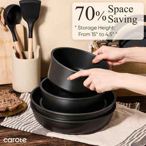 Hands stacking Detachable Handle 19 Piece Nonstick Cookware Set For Induction Cooktops, showcasing space-saving feature.