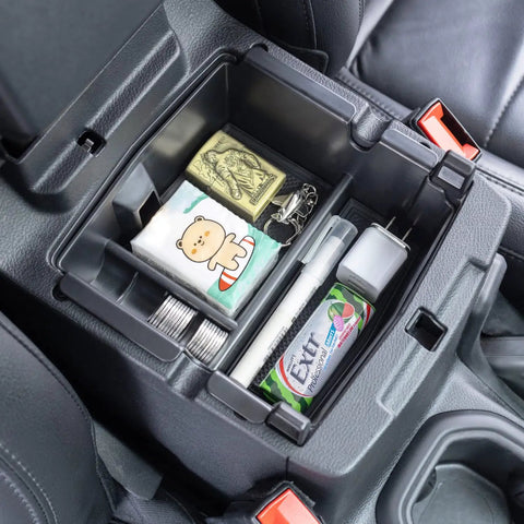 Center Console Organizer For Jeep Wrangler JL JLU And Gladiator JT 2018 Through 2026 Armrest Storage Tray with items inside