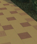 Outdoor pathway with decorative cement tiles, possibly created using Turtle Stepping Stone Mold For Garden Pathways, blending in garden setting.