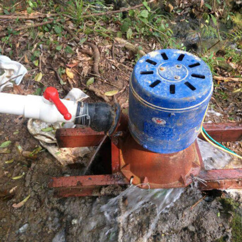 4000W Single Phase Permanent Magnet Inclined Impact Micro Hydro Generator 4kW Water Turbine Power System For Your Home Off Grid Lighting 220V Aluminum Alloy Portable Hydroelectric Generator With Valve installed near stream.