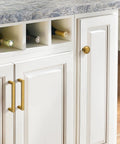 Antique Brass Drawer Pulls Set 10 Pack 1.25 Inch Cabinet Knobs for cabinets with marble countertop and wine rack.