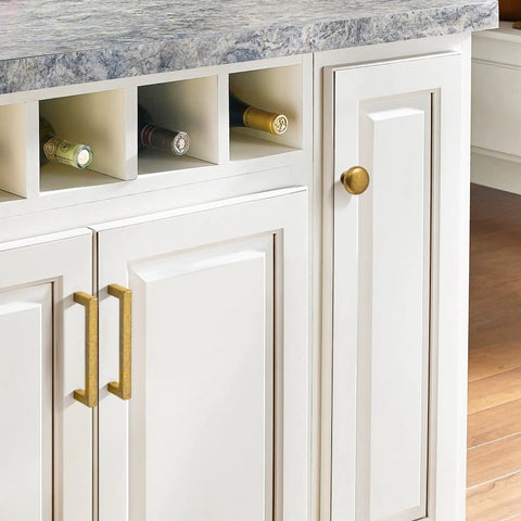 Antique Brass Drawer Pulls Set 10 Pack 1.25 Inch Cabinet Knobs for cabinets with marble countertop and wine rack.