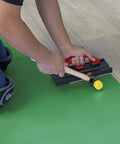 Installing Top Shelf Premium Acoustical Underlayment Roll For Hardwood Floors 100 Square Foot Sound Dampening Foam with a mallet.