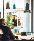 Cafe scene with person reading by window, AM FM Radio Kit For Learning And Practice A Hands On Soldering Project That Teaches Electronics visible