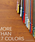 Assorted graduation cords in various colors displayed against wood background, including Royal Blue And White Graduation Cords For 2026 Honor Cord Braided 67 Inch Long Graduation Ropes For Ceremony Decor And Bachelor Gown Accessories Sweet Gift Idea For Graduation Parties.